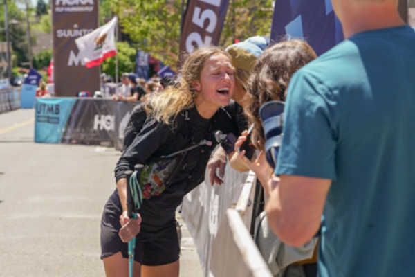 Brooke hugging her mom after crossing the finish line