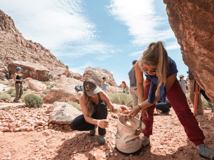 Climbers cleaning up crag