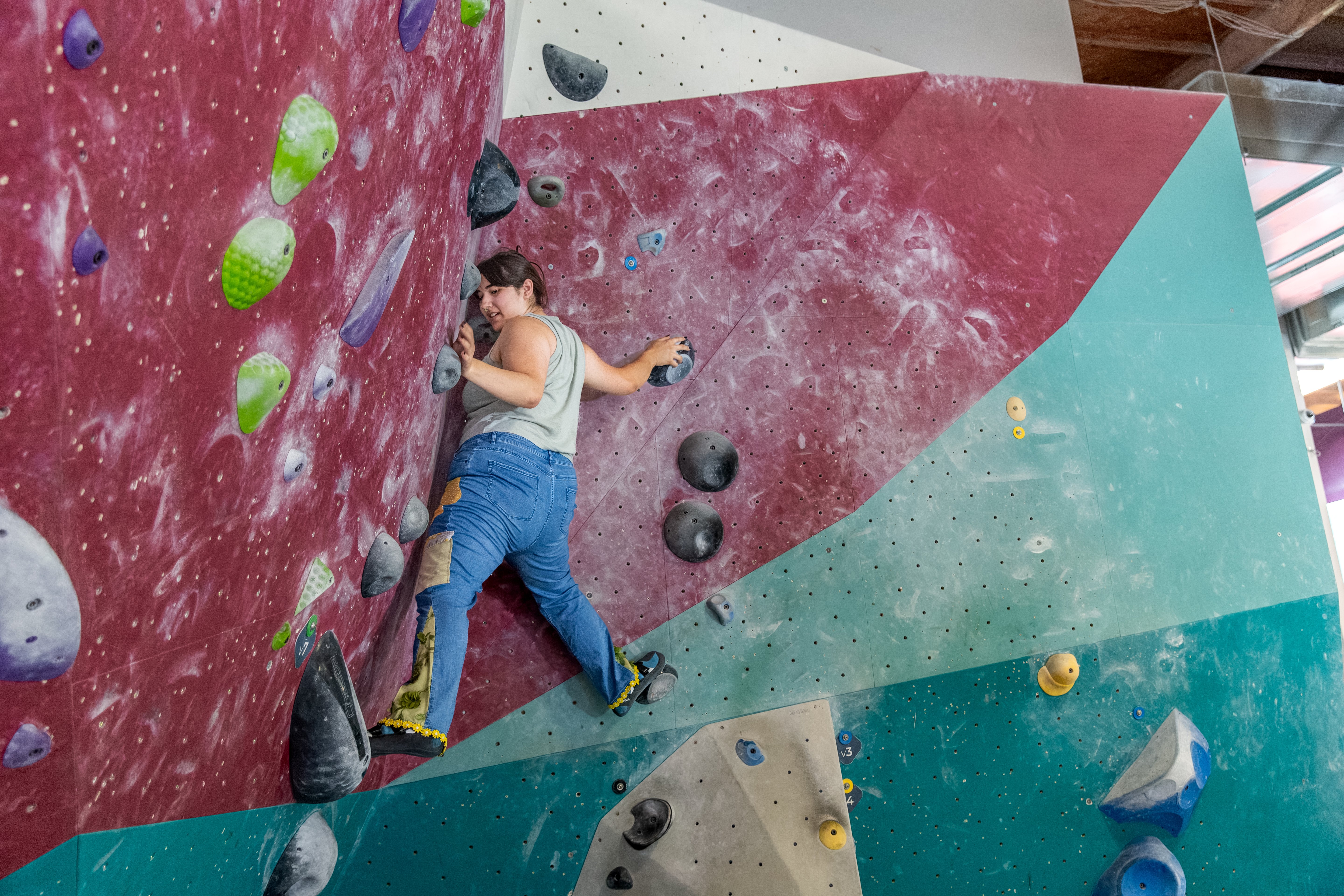 Climber using the stemming technique while climbing