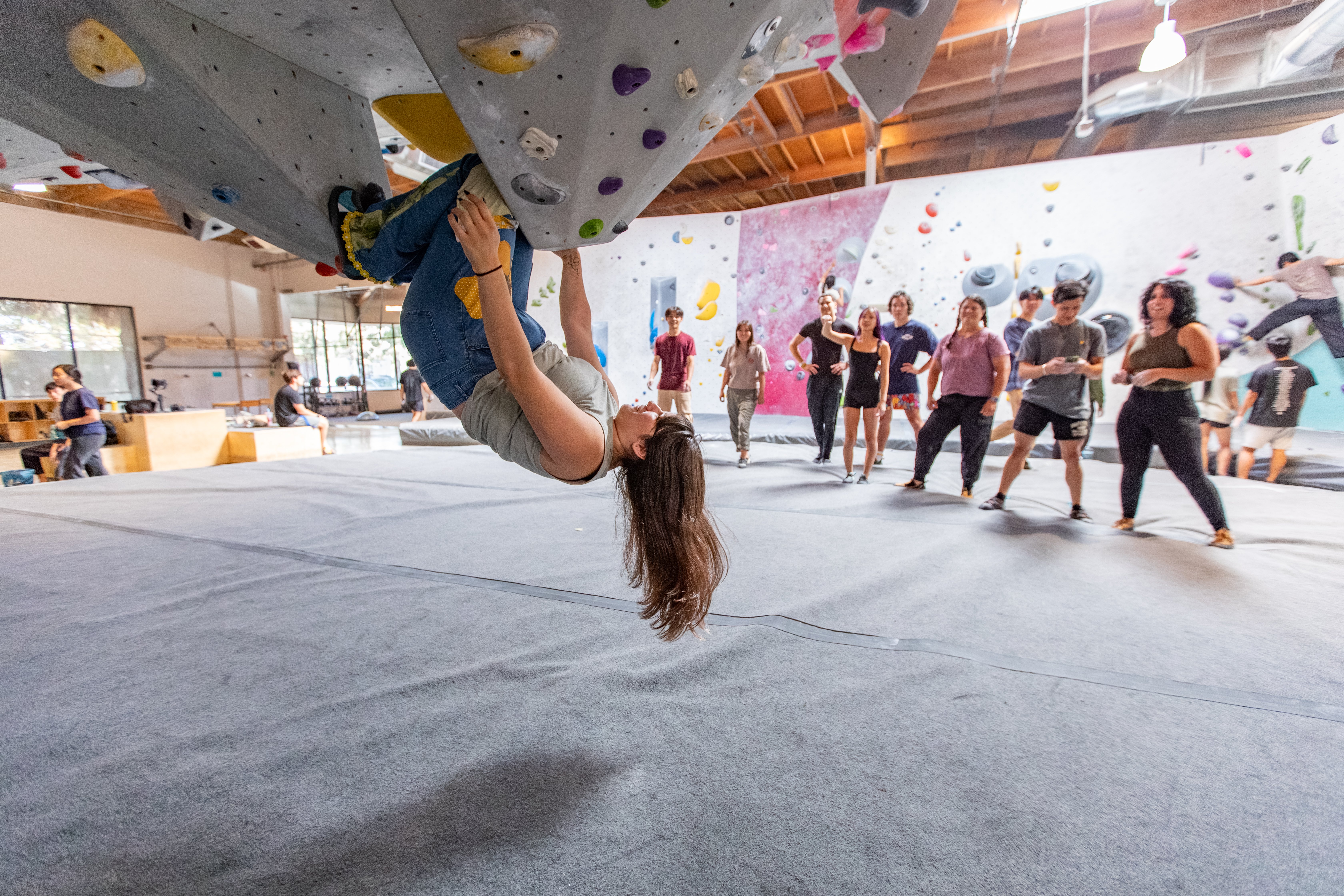 Climber using the knee bar technique while climbing