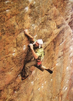 John Vermin Sherman sips a beer mid-climb in Australia